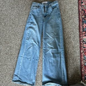 Just black denim jeans.